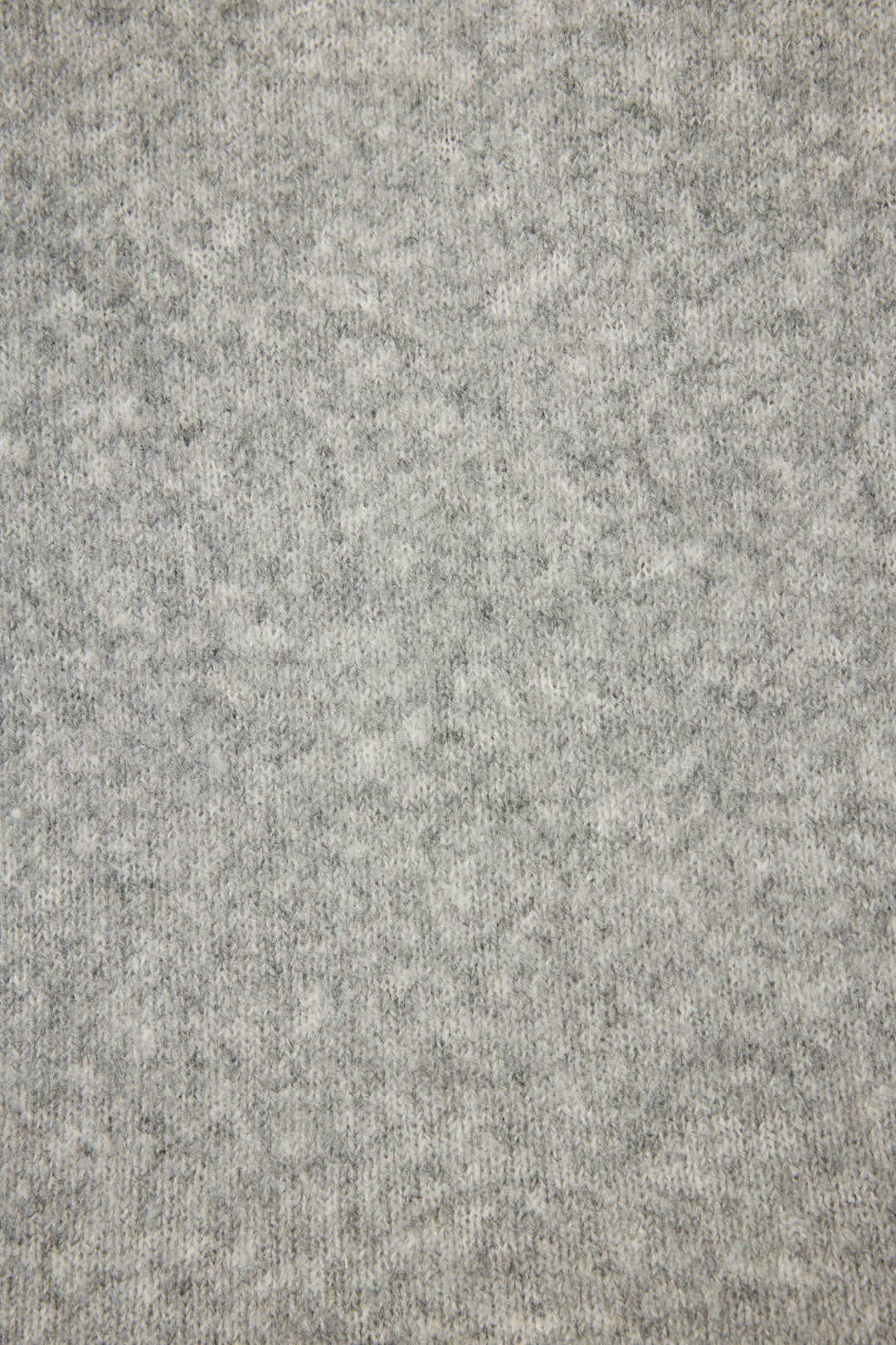 Close-up view of the Snuggle Sweater SLEIGH CREW LONG SLEEVE FLANNELS by P.J. Salvage, featuring light gray heathered knit fabric with a soft, slightly fuzzy texture and subtle mottled pattern.