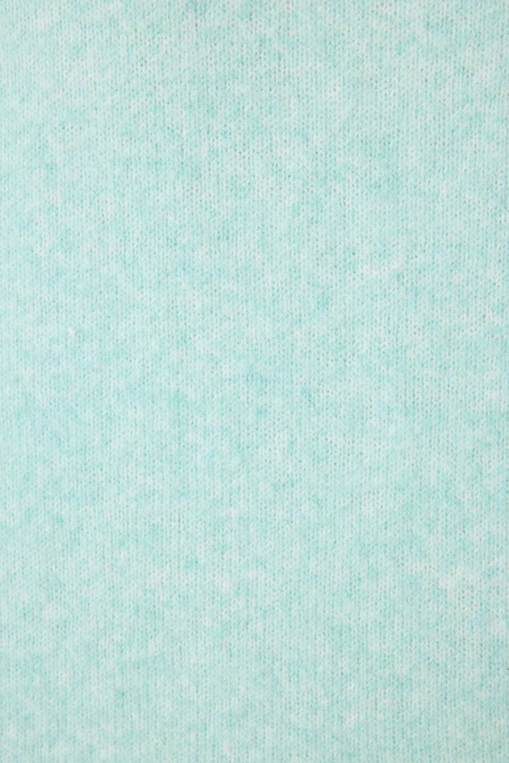 Close-up of the Ma Cherie Snuggle Sweater by P.J. Salvage, featuring light blue, textured fabric with a subtle speckled pattern and a soft, fuzzy knit—ideal for cozy lounging and ultimate comfort.