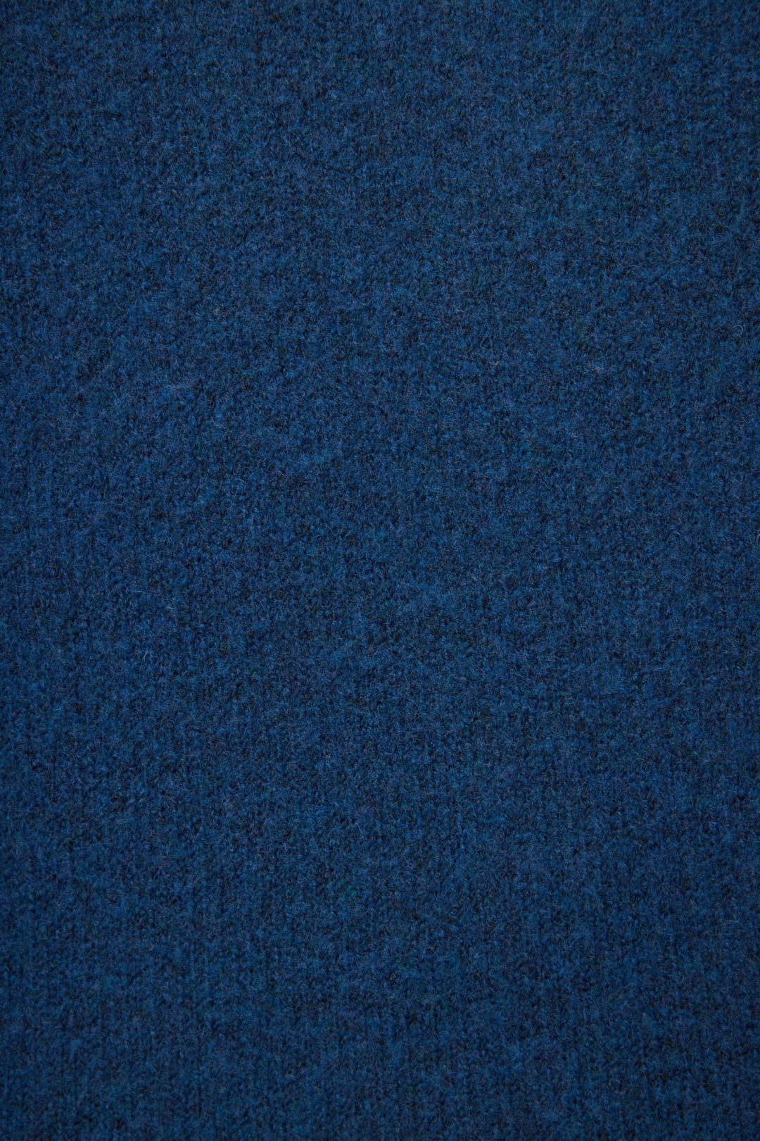 A close-up view of the textured, dark blue Snuggle Sweater SLEIGH CREW LONG SLEEVE FLANNELS by P.J. Salvage.