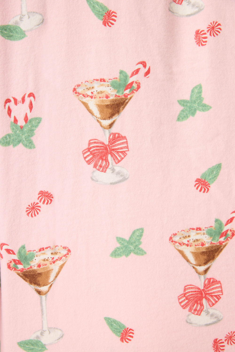 The Tini Time Drink Print Flannel Plus Size PJ Set by P.J. Salvage features a pink fabric with martini glasses, candy canes, red bows, green mint leaves, and peppermint candies in a festive repeating pattern.