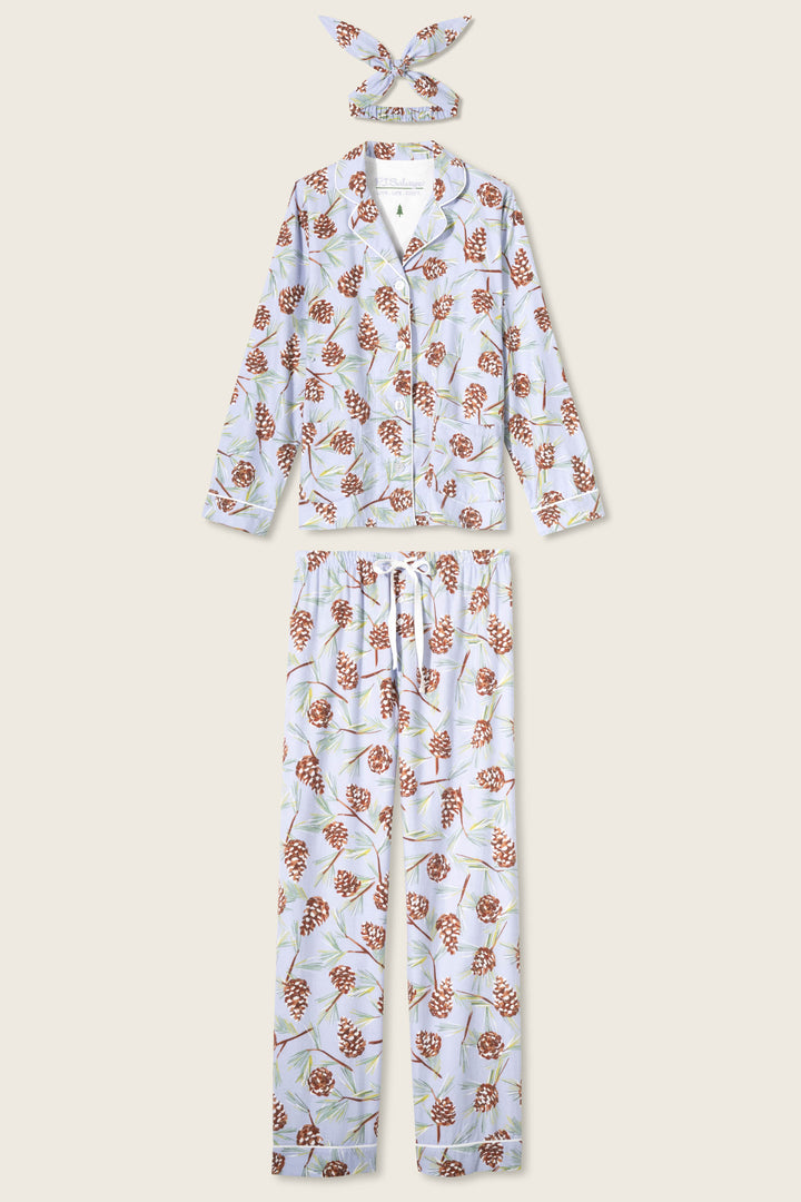 The Feelin' Pine Pinecone Print PJ Set by P.J. Salvage includes a long-sleeve button-up top, long pants, and a matching headband with a white background and brown pinecone and green branch pattern.