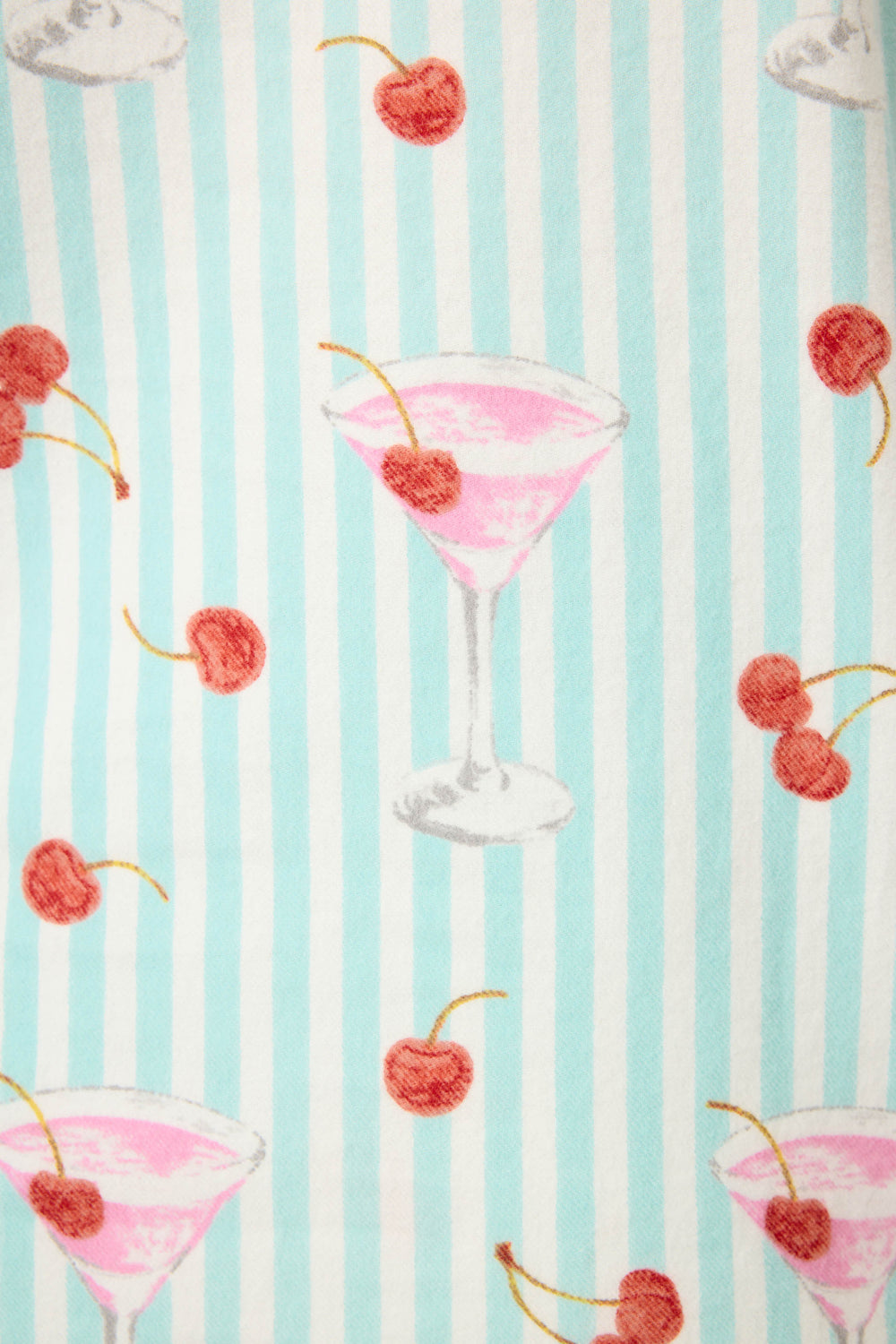 The 3-Piece Set PAISLEY PJ SET FLANNELS by P.J. Salvage features a playful pink cocktail and cherry pattern in martini glasses, set on a light blue and white vertical striped background.