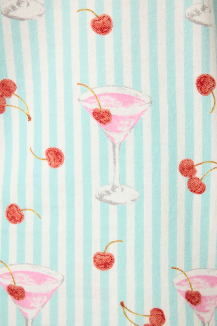 The 3-Piece Set PAISLEY PJ SET FLANNELS by P.J. Salvage features a playful pink cocktail and cherry pattern in martini glasses, set on a light blue and white vertical striped background.