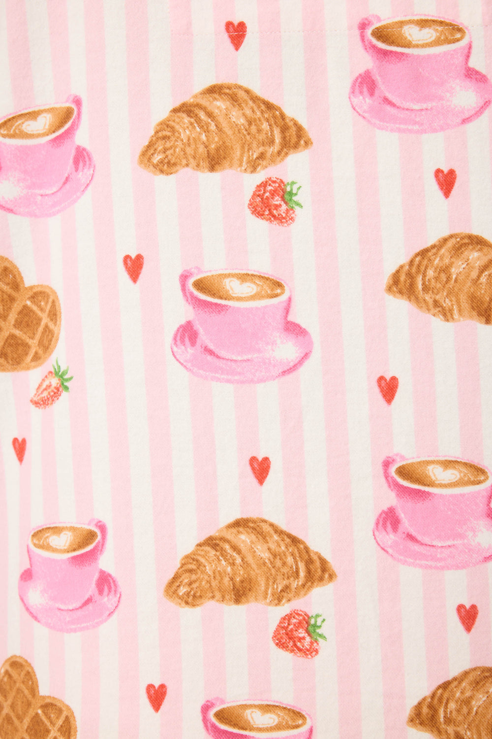 The Brunch Club Breakfast Print Flannel PJ Set by P.J. Salvage features pink coffee cups with latte art, croissants, red hearts, and strawberries on a white background with pink stripes.