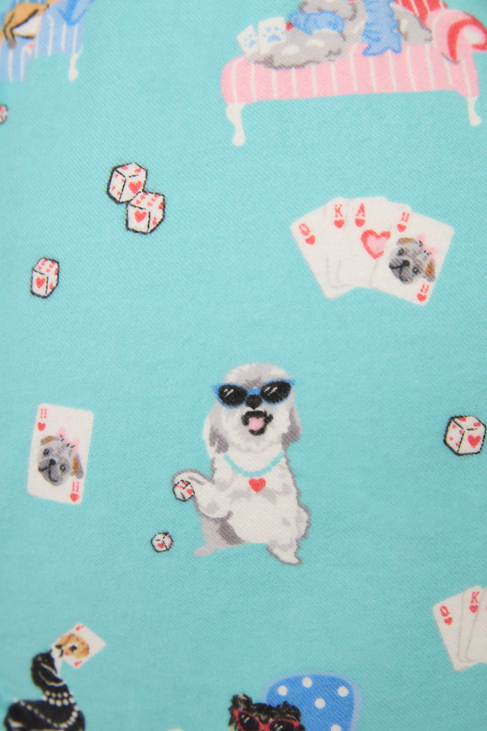 Small dogs in sunglasses and accessories play poker with cards, dice, and chips on chairs against a light blue backdrop. Featured: This Is How I Roll Dog Print Flannel Shorts by P.J. Salvage.