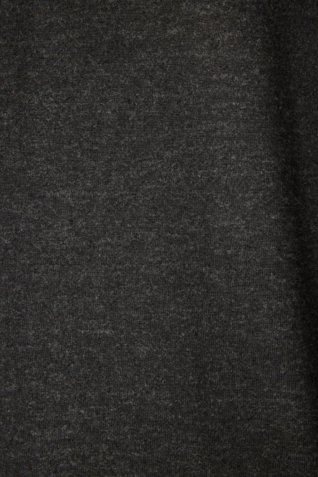 Close-up of the FEELINE SPOOKY LONG SLEEVE FELINE SPOOKY by P.J. Salvage, featuring dark gray, textured fabric with a soft, slightly fuzzy surface and subtle shading variations.