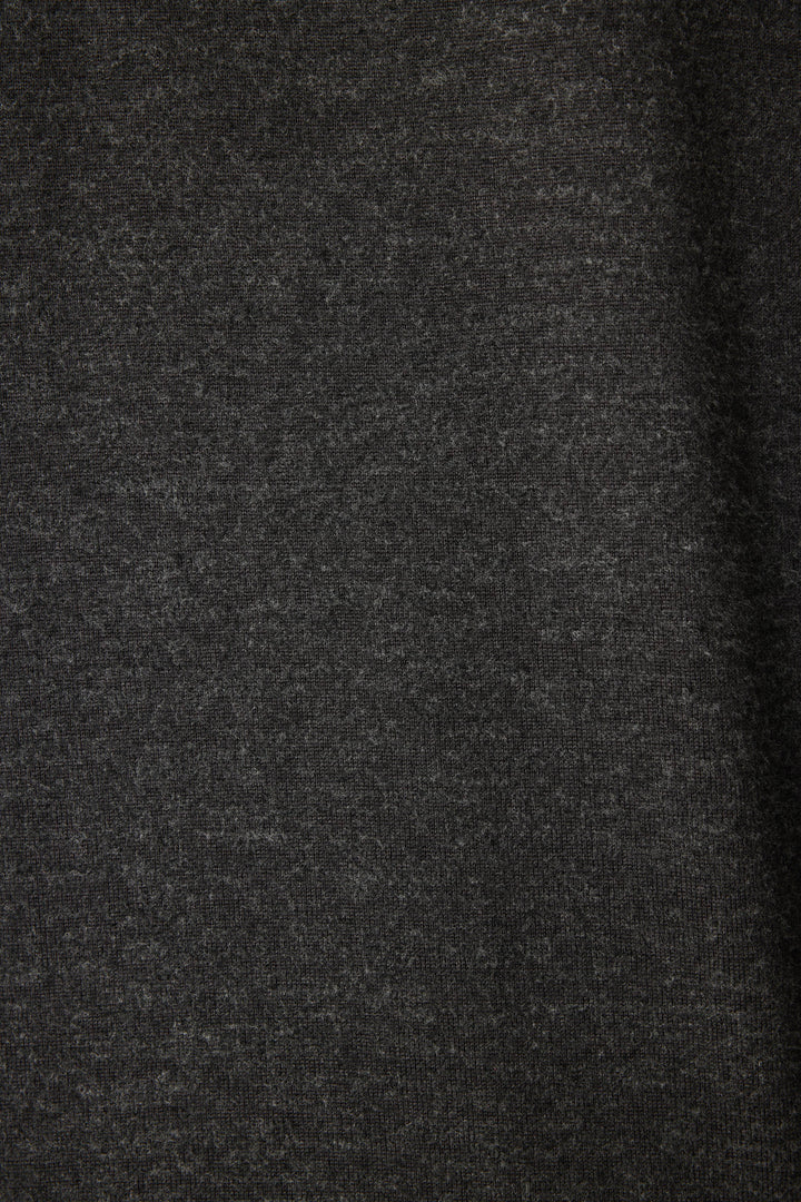 Close-up of the FEELINE SPOOKY LONG SLEEVE FELINE SPOOKY by P.J. Salvage, featuring dark gray, textured fabric with a soft, slightly fuzzy surface and subtle shading variations.
