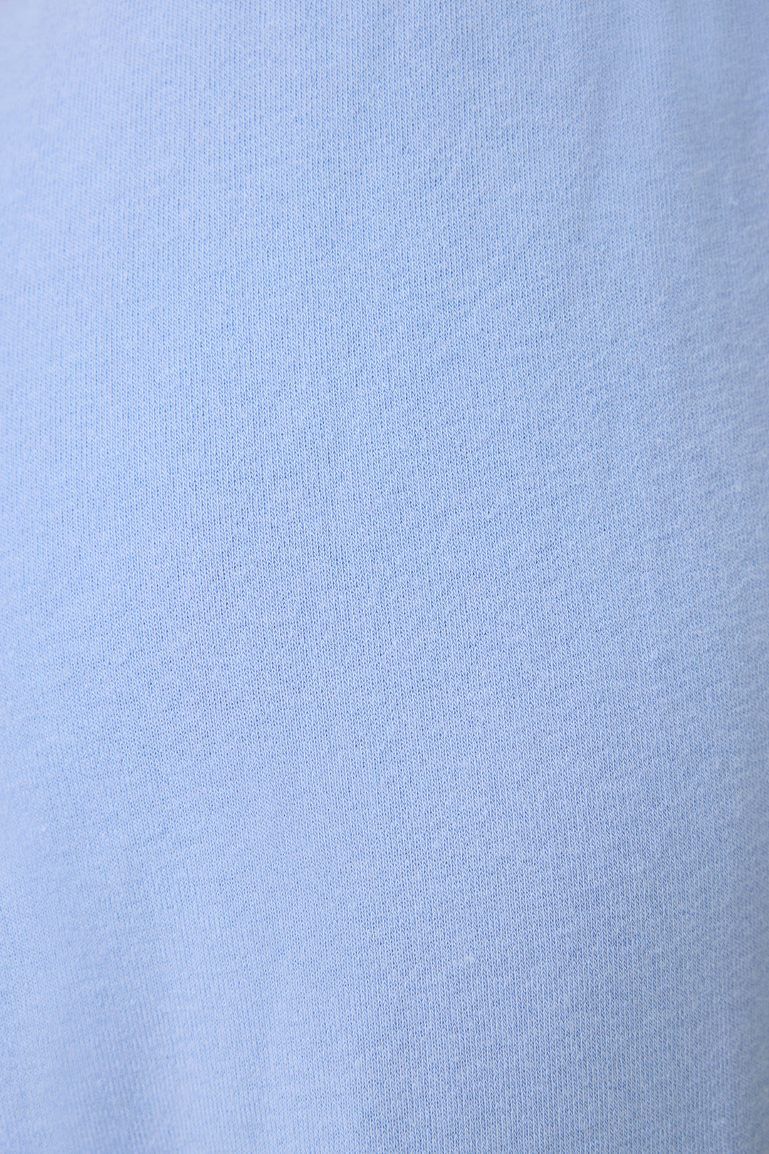 Close-up of the SOLID BANDED PANT LADY LUCK by P.J. Salvage, featuring light blue fabric with a soft, smooth texture and a fine, even weave pattern.