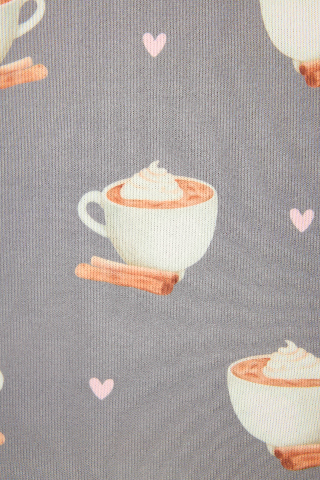 The P.J. Salvage Love You A Latte Coffee Print Banded Pant features a gray fabric with white cups of whipped cream-topped hot chocolate, cinnamon sticks, and small pink hearts.