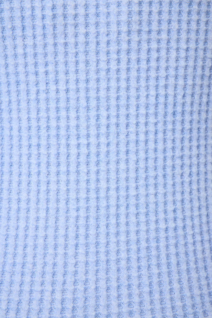 Close-up of the Morning Waffles Solid Peri Open Leg Pant by P.J. Salvage, featuring a light blue and white vertical ribbed texture for a soft, slightly fuzzy look.