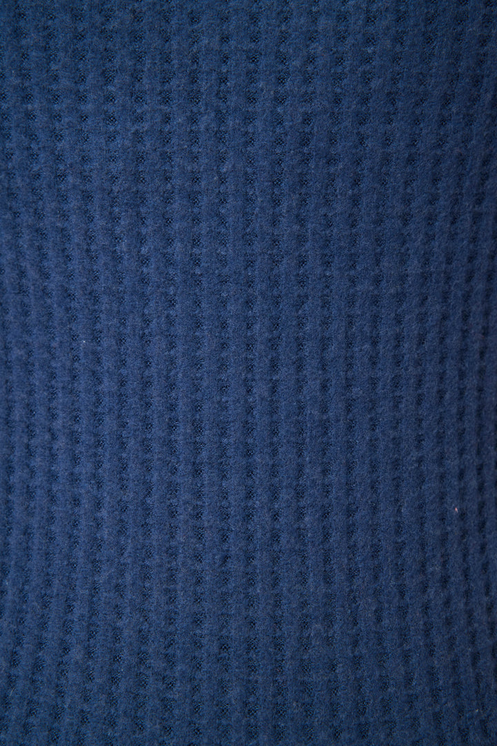 Close-up of the Morning Waffles Harbor Loungewear Set by P.J. Salvage, featuring textured dark blue waffle knit fabric with a repeating ribbed pattern—soft, cozy, and perfect for relaxing in style.
