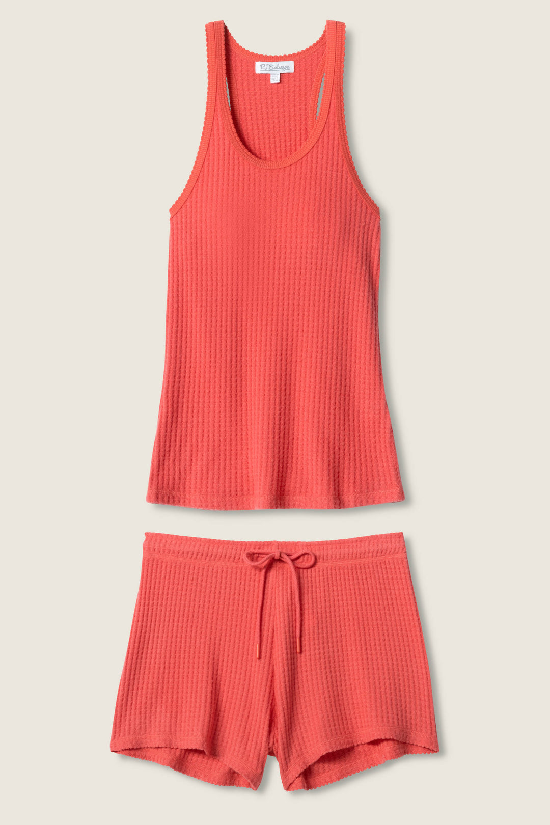 The P.J. Salvage Morning Waffles Scarlet Loungewear Set, featuring a sleeveless scoop neck tank and elastic drawstring shorts, is displayed on a neutral background—perfect cozy loungewear for relaxing in style.