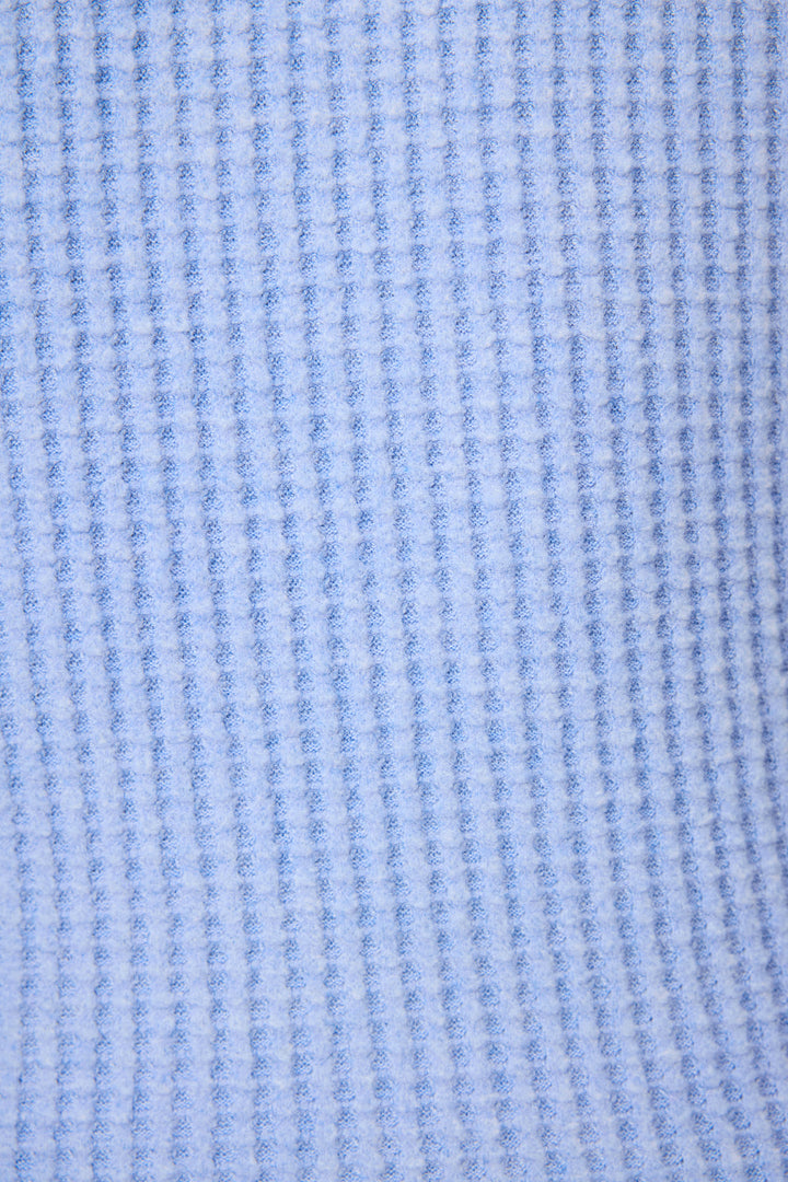 Close-up of the Morning Waffles Solid Peri Tank Top by P.J. Salvage, showing its soft, textured fabric with vertical light blue and white stripes, giving a cozy knit or fleece-like appearance.