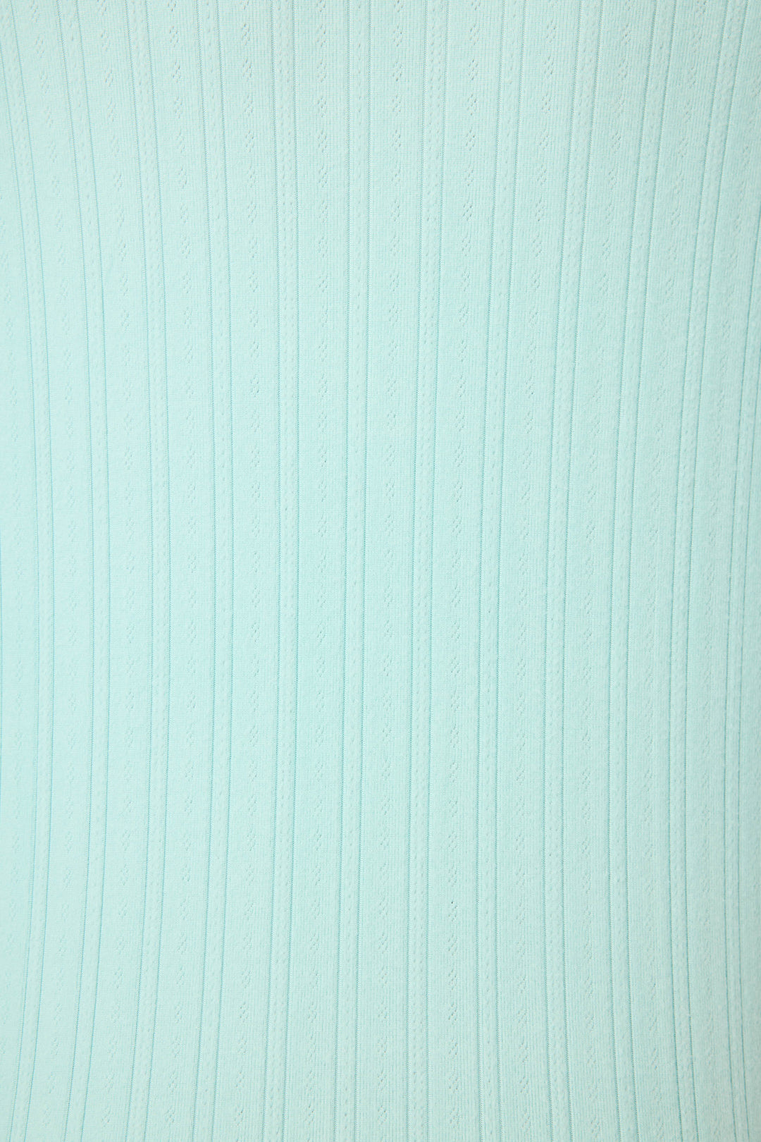 The P.J. Salvage Pointelle Essentials Solid Mint Night Shirt features a light blue textured surface with evenly spaced vertical lines and subtle wavy patterns from top to bottom.