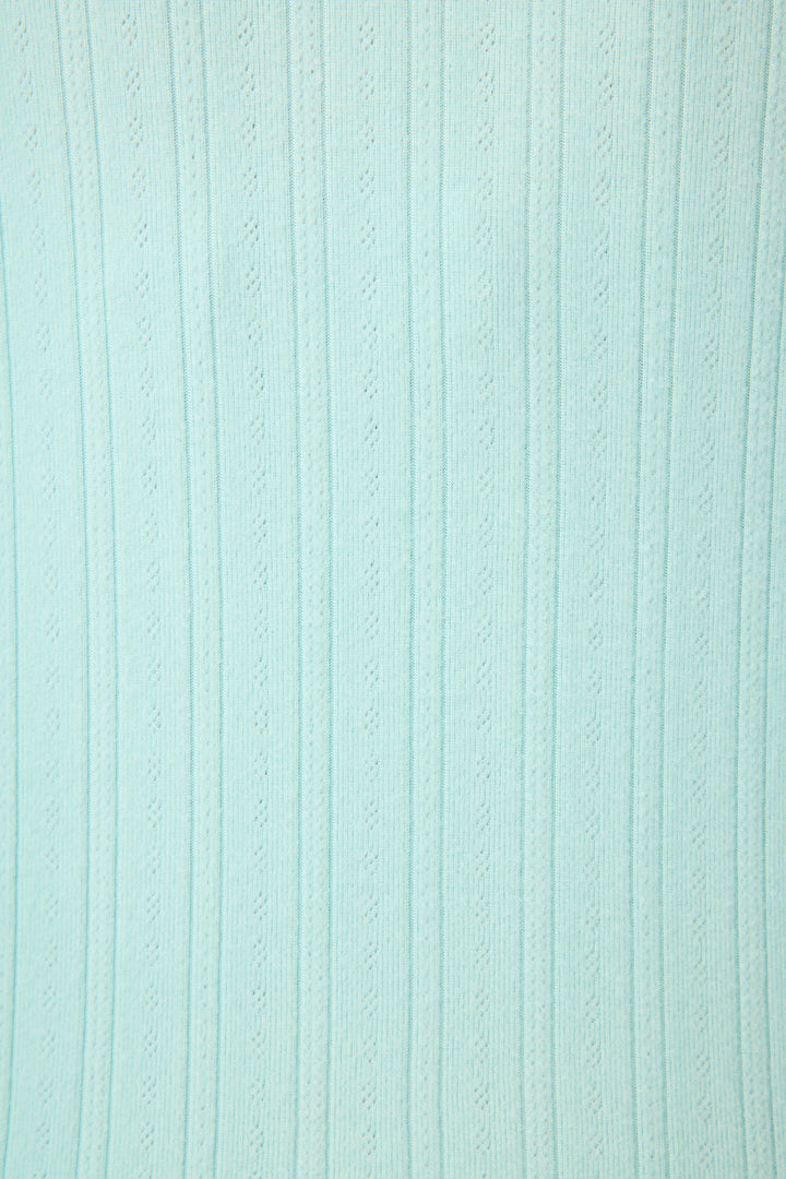 Close-up of Pointelle Essentials Solid Mint Shorts by P.J. Salvage, featuring light blue ribbed fabric with evenly spaced vertical textured lines.
