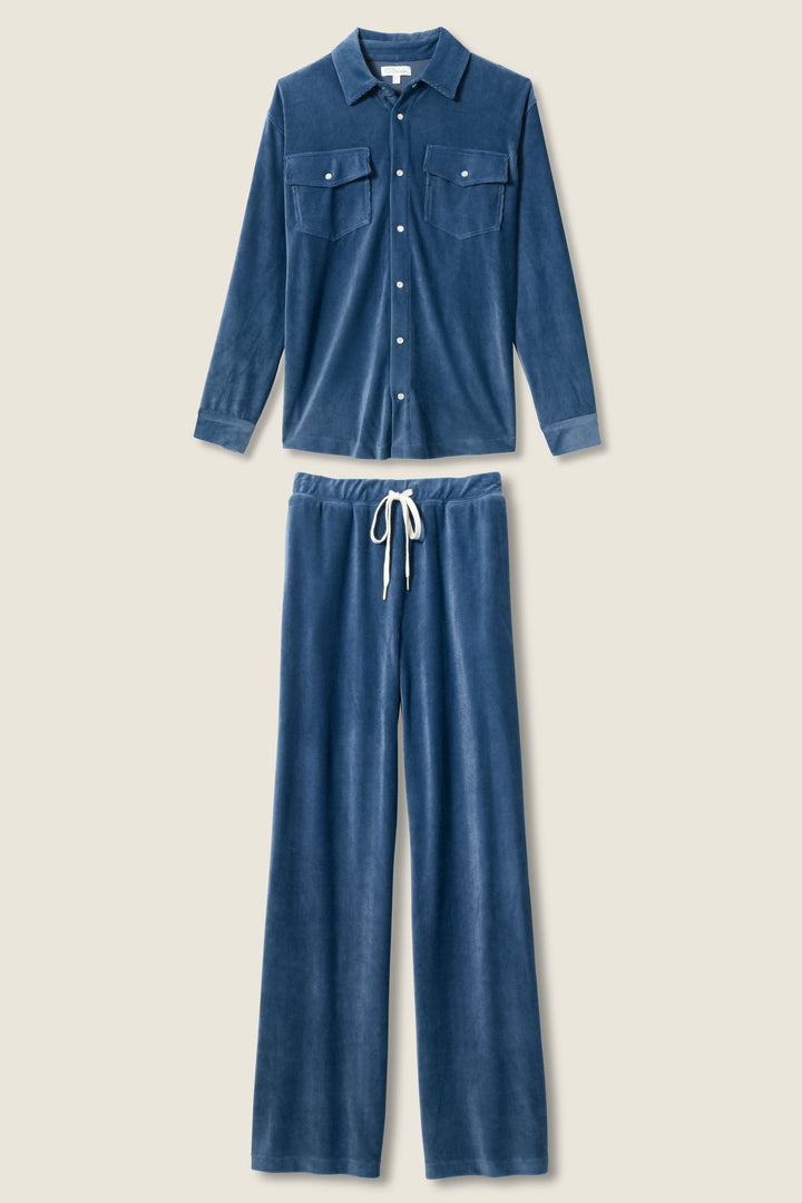 The Craving Corduroy Velour Lounge Set by P.J. Salvage, in blue, features a retro button-up shirt with two chest pockets and matching wide-leg drawstring pants, both shown laid flat on a neutral background.