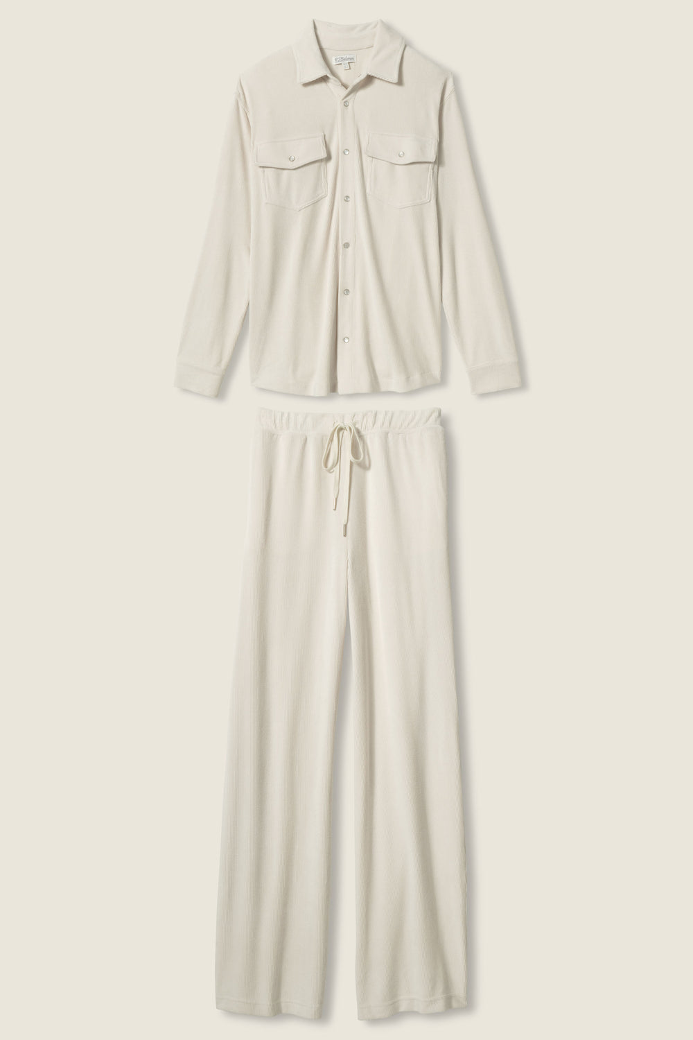 The SOLID PJ SET CRAVING CORDUROY by P.J. Salvage features a cream long-sleeve, button-up shirt with two chest pockets and drawstring pants, both crafted from soft, textured corduroy and shown against a light background.