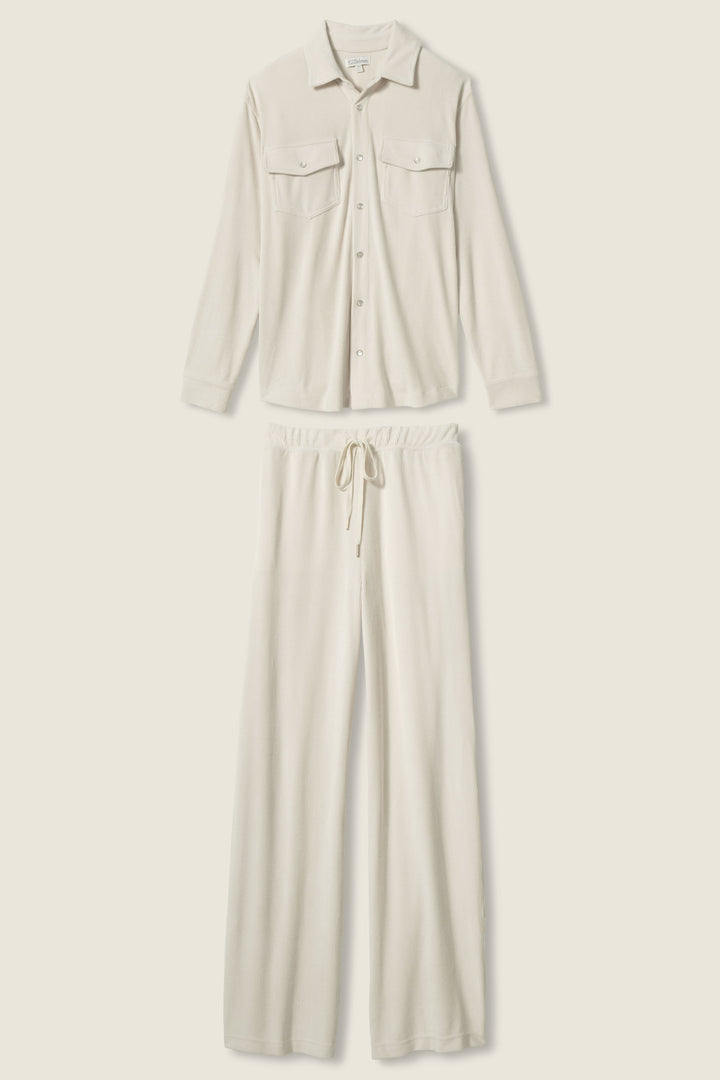 The SOLID PJ SET CRAVING CORDUROY by P.J. Salvage features a cream long-sleeve, button-up shirt with two chest pockets and drawstring pants, both crafted from soft, textured corduroy and shown against a light background.