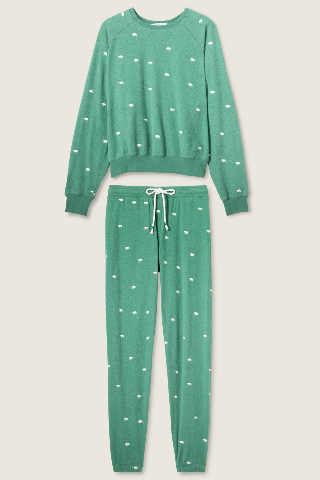 The Outsider Embroidered Bear Fleece Lounge Set by P.J. Salvage features a green long-sleeve crewneck top and drawstring pants, both adorned with small white dotted patterns throughout.