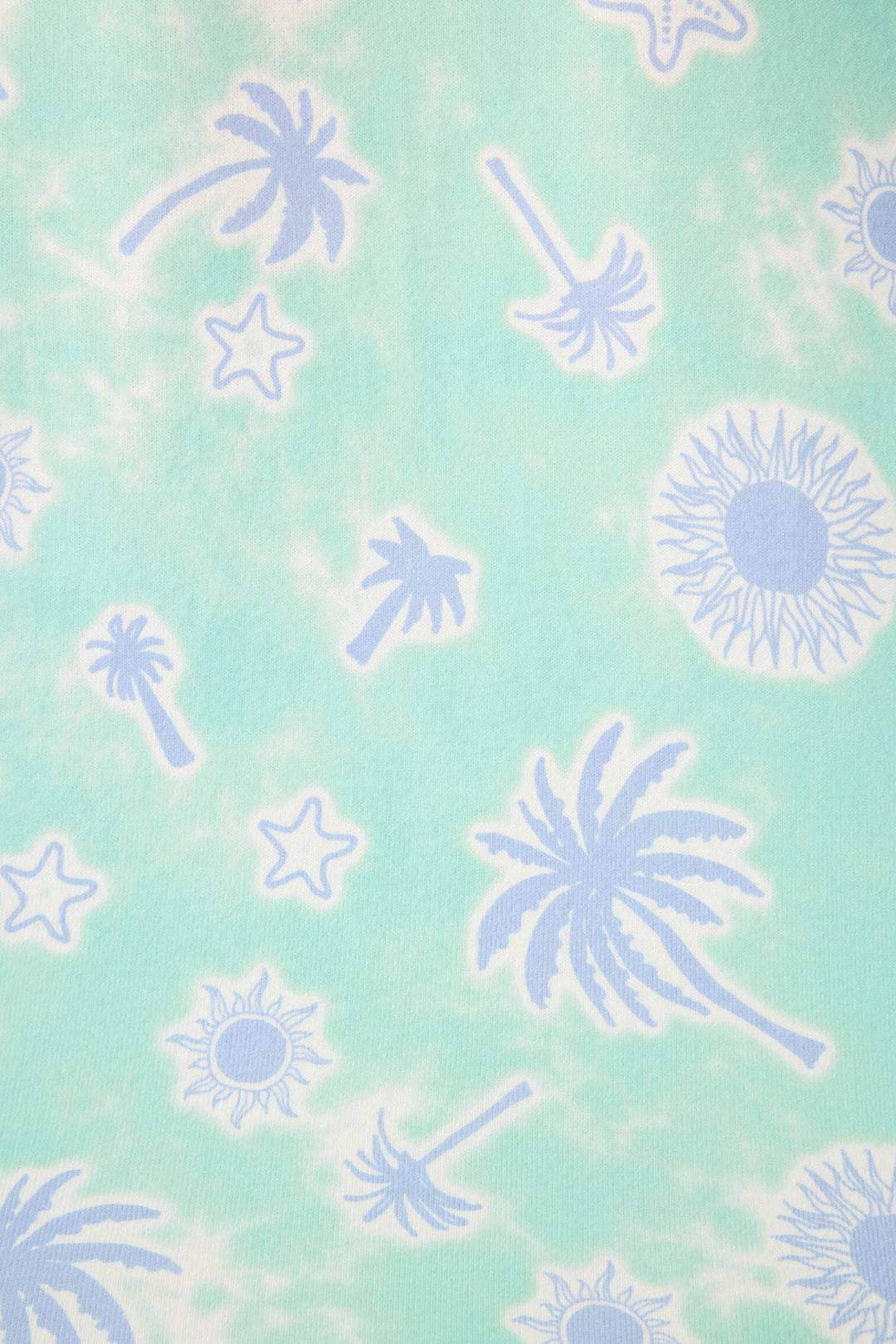 The Vacay Vibes Palm Print Banded Pants by P.J. Salvage feature a light green and white tie-dye design with repeating light blue palm trees, suns, and stars scattered across the fabric.