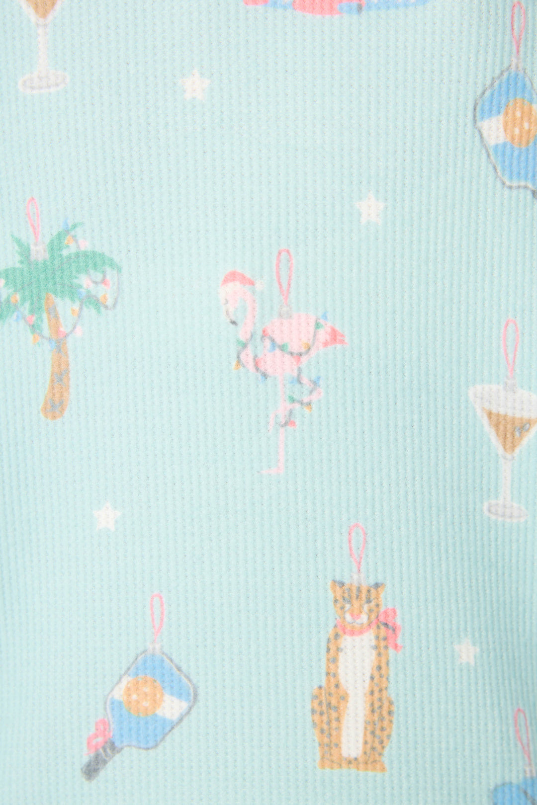The Boyfriend Boxer Ornament Print Shorts Set by P.J. Salvage features light blue fabric adorned with palm trees, flamingos, cocktails, a tennis racket, a seated leopard, and small white stars.