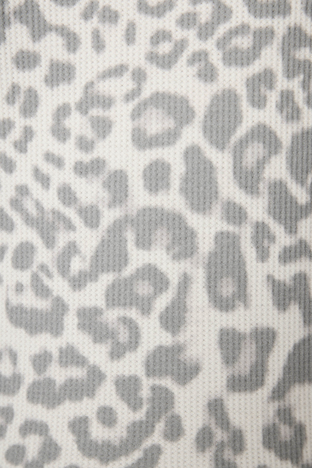 The P.J. Salvage Boyfriend Boxer Leopard Print Shorts Set features a gray and white abstract leopard print with irregular spots on a textured fabric surface.
