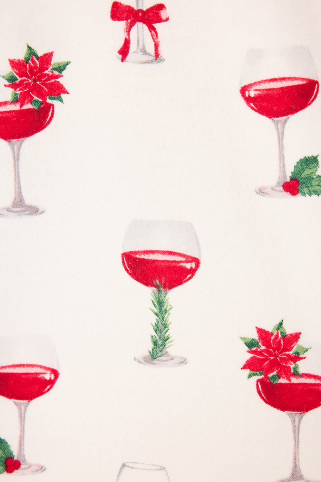 The BEARS PJ SET FLANNELS by P.J. Salvage features a white background with red wine glasses, each adorned with holiday touches like poinsettias, holly, a red bow, and greenery.