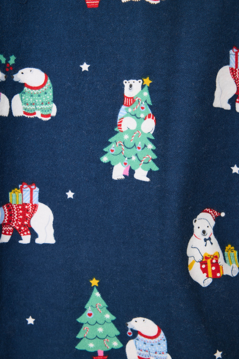 The P.J. Salvage 3-Piece Bear Print Flannel PJ Set features polar bears in festive sweaters with Christmas gifts and tree decorations, all on a dark blue background with white stars.