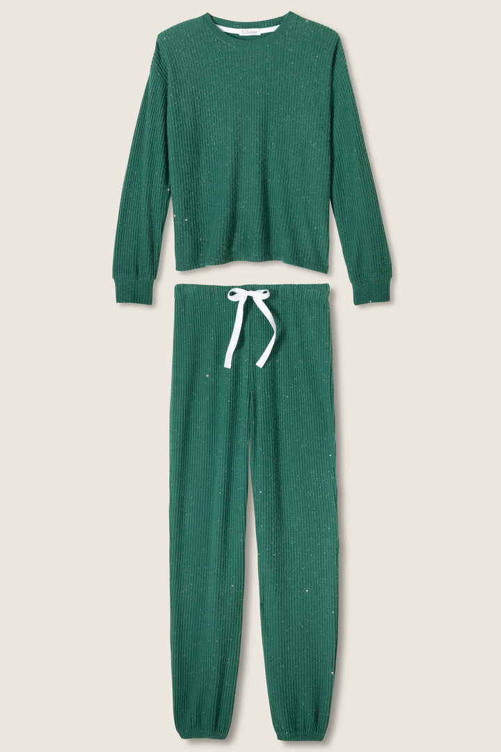 The SOLID PJ SET FIRESIDE SPARKLE by P.J. Salvage features a matching green ribbed knit lounge set with a long-sleeve top and drawstring pants with a white waist tie, displayed on a light beige background.
