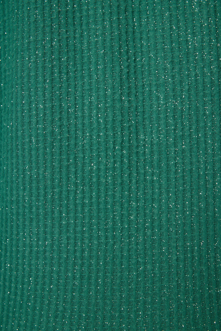 Close-up of the SOLID PJ SET FIRESIDE SPARKLE SETS by P.J. Salvage, featuring green ribbed fabric with fine vertical lines and subtle silver glitter accents throughout.