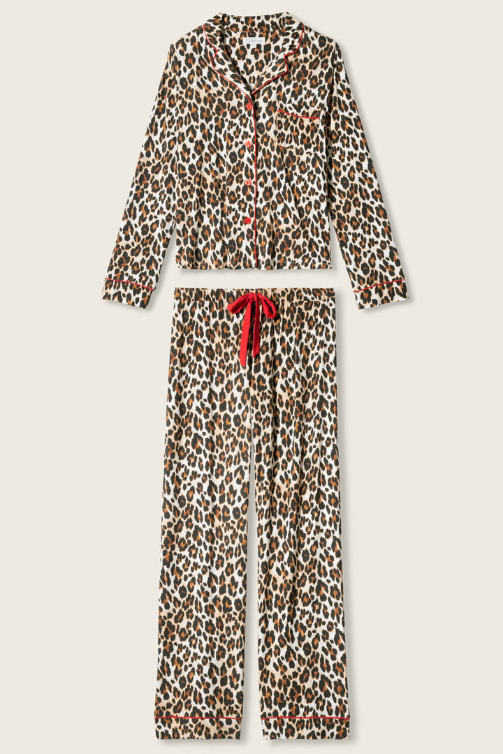 The LEOPARD PJ SET HOLIDAY DREA by P.J. Salvage features a brown and black leopard print, a long-sleeve button-up collared top, and matching long pants with a red drawstring and red trim.
