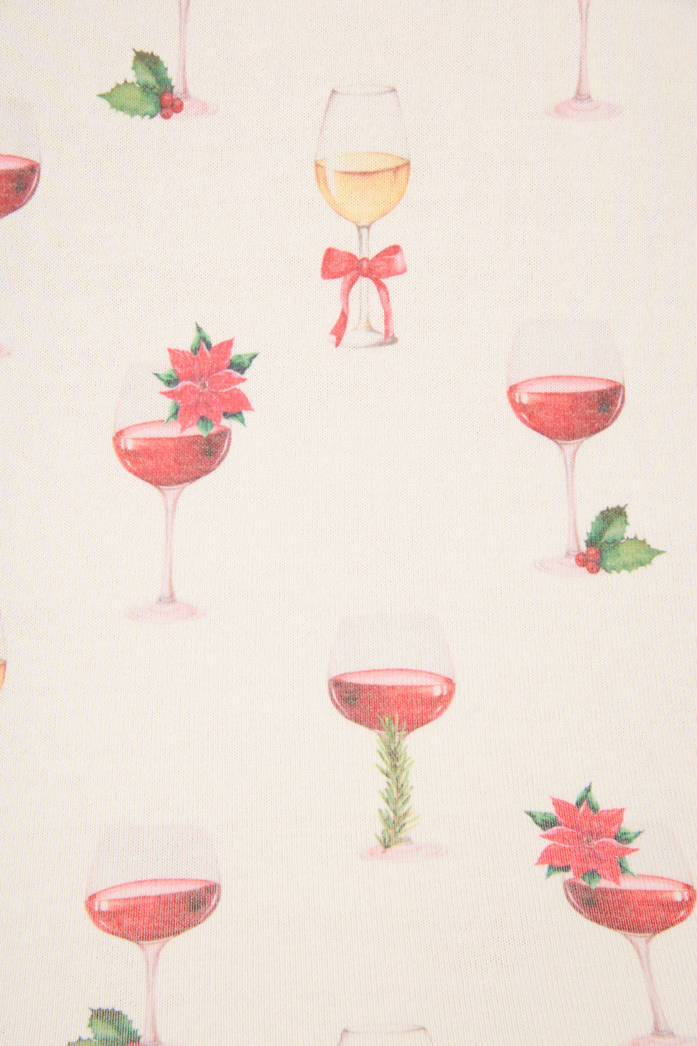The P.J. Salvage Let's Get Toasty Holiday Wine Print Plus Size Pants Set features a cream background with wine glasses filled with red and white wine, adorned with holly, poinsettias, ribbons, and rosemary sprigs.