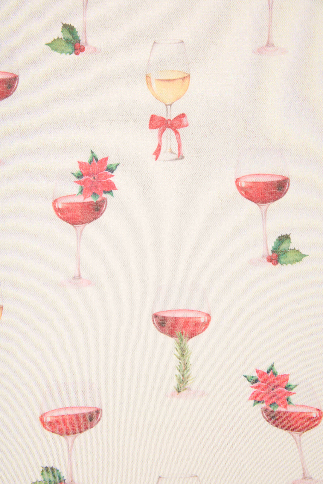 The P.J. Salvage Let's Get Toasty Holiday Wine Print Plus Size Pants Set features a cream background with wine glasses filled with red and white wine, adorned with holly, poinsettias, ribbons, and rosemary sprigs.