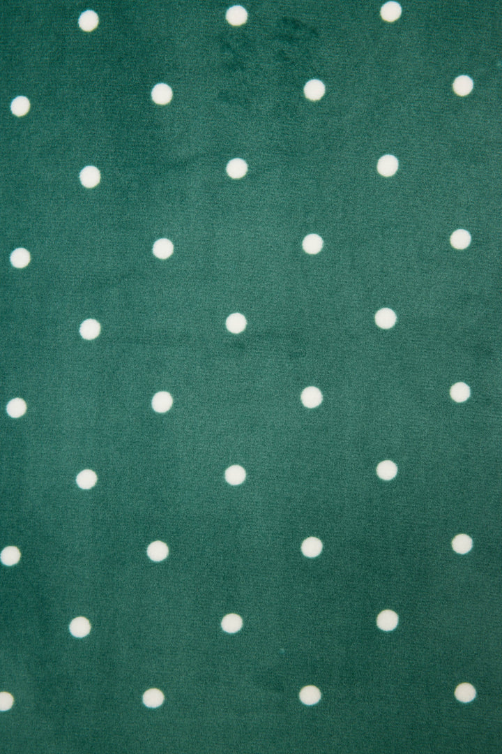 The Let's Get Toasty Dot Print Pants Set by P.J. Salvage features green fabric with evenly spaced white polka dots in a grid pattern.