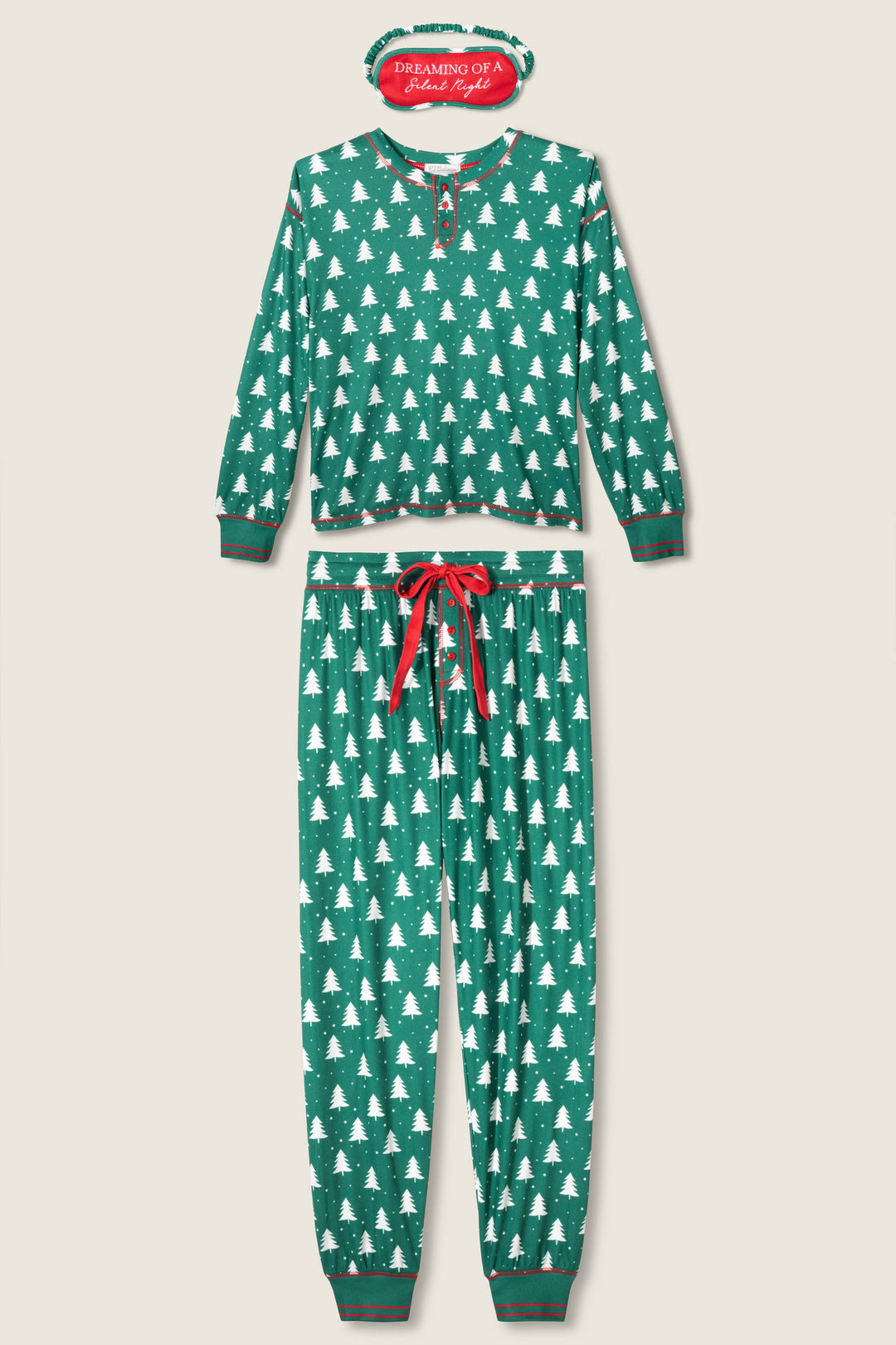 The 3-Piece Tree Print Pointelle PJ Set by P.J. Salvage includes forest-green pajamas with a white tree print, red buttons, red drawstring pants, and a matching "DREAMING OF A Silent Night" eye mask—perfect for cozy holiday nights.