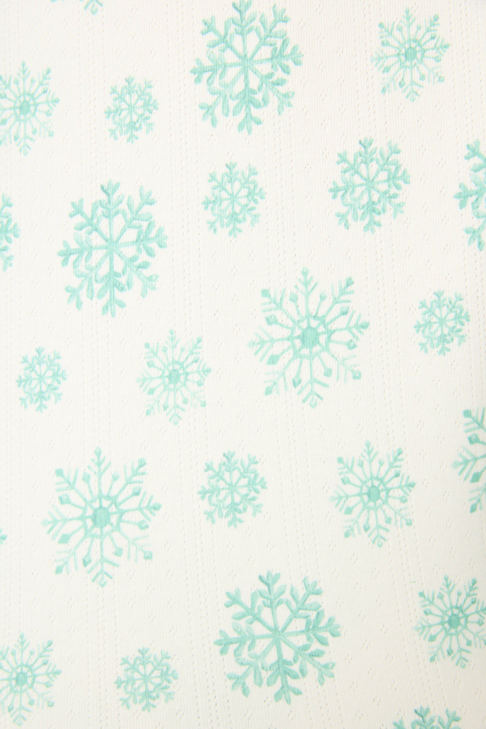 The SNOWFLAKE SHORT SNOWFLAKE WISHES by P.J. Salvage features a white background with an evenly spaced pattern of teal snowflakes in various sizes.
