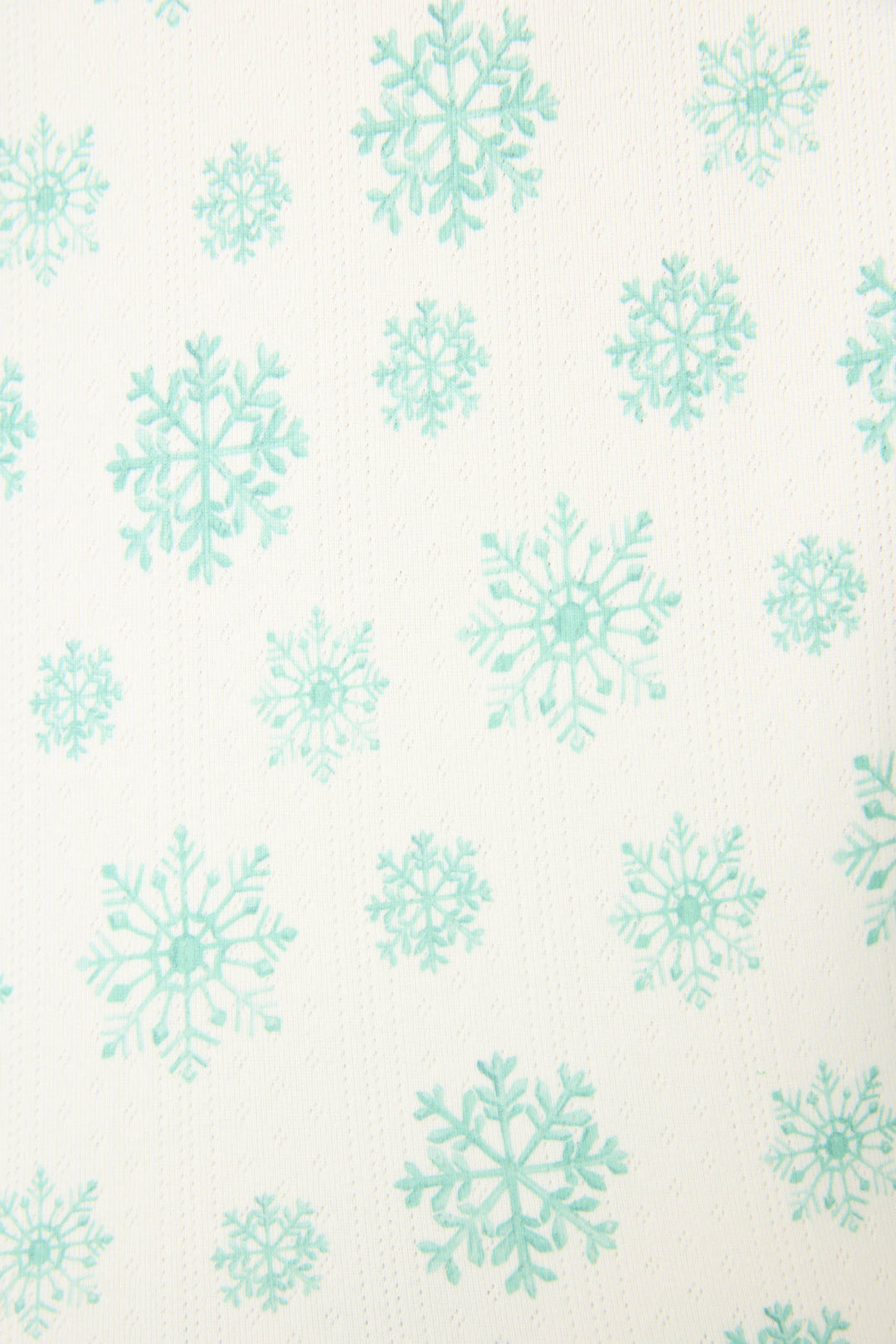 The SNOWFLAKE SHORT SNOWFLAKE WISHES by P.J. Salvage features a white background with an evenly spaced pattern of teal snowflakes in various sizes.