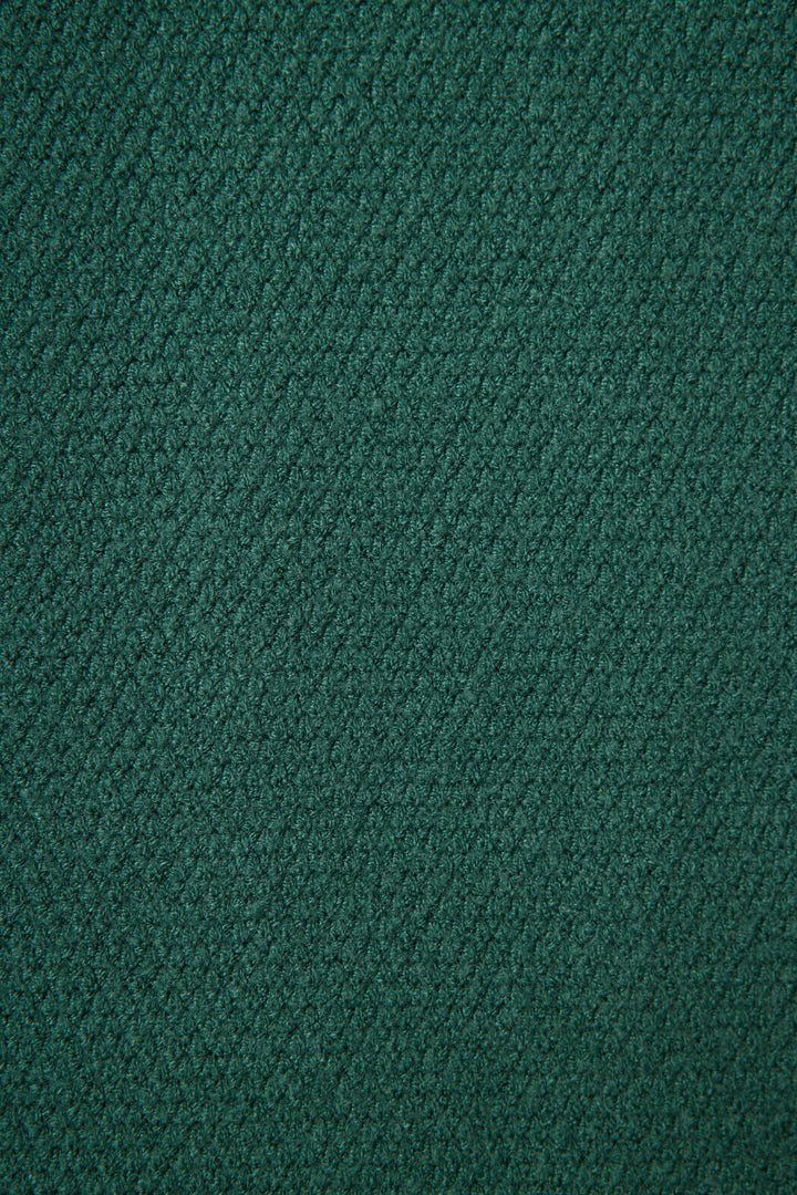 Close-up of the SOLID PJ SET SWEATER WEATHER by P.J. Salvage shows a textured green fabric with a subtle diagonal pattern, soft appearance, slight loft, and consistent color throughout.