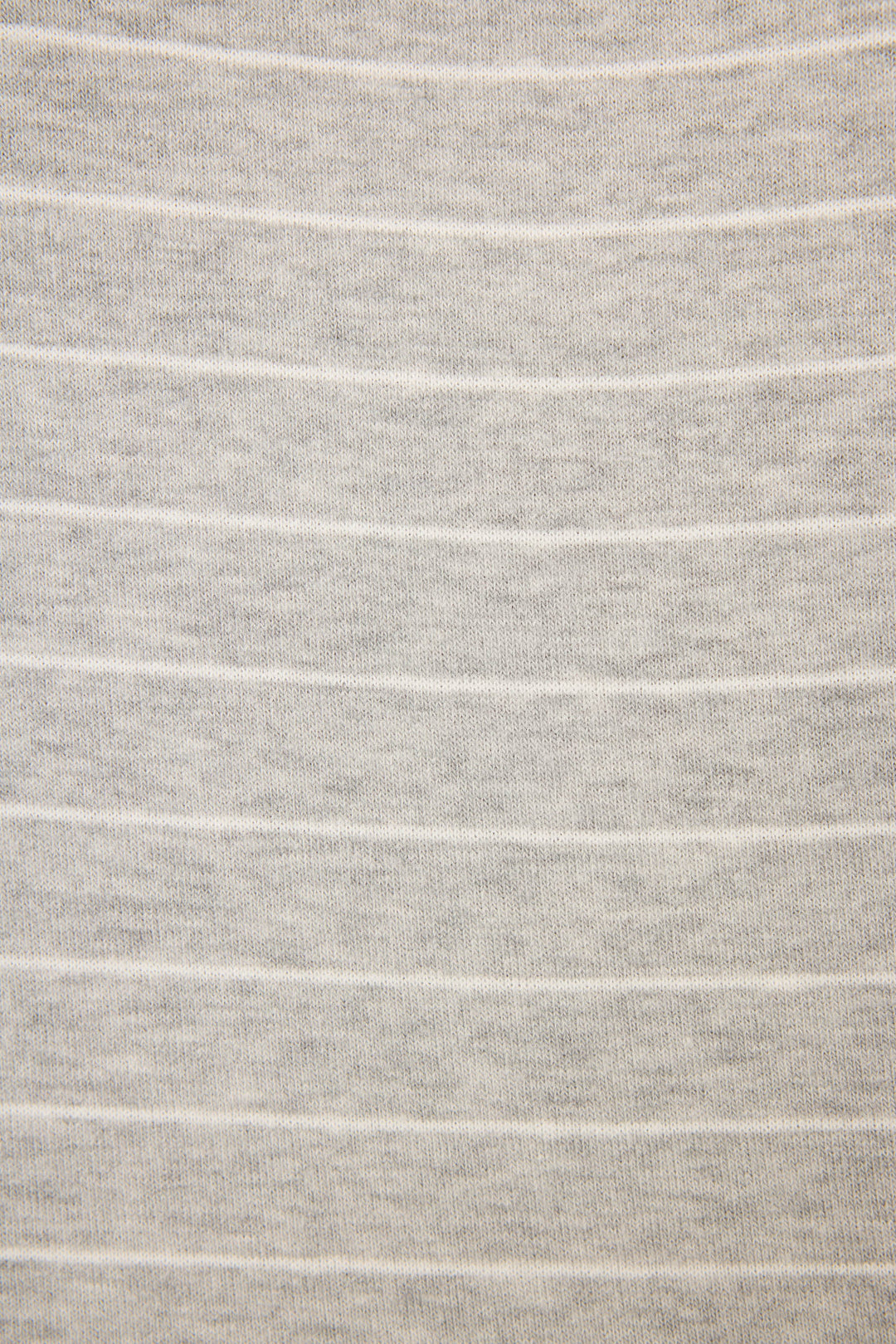 Close-up of the P.J. Salvage "My Dog Is My Valentine" Striped Hoodie’s light beige fabric, featuring soft ribbed texture and evenly spaced thin white horizontal stripes.