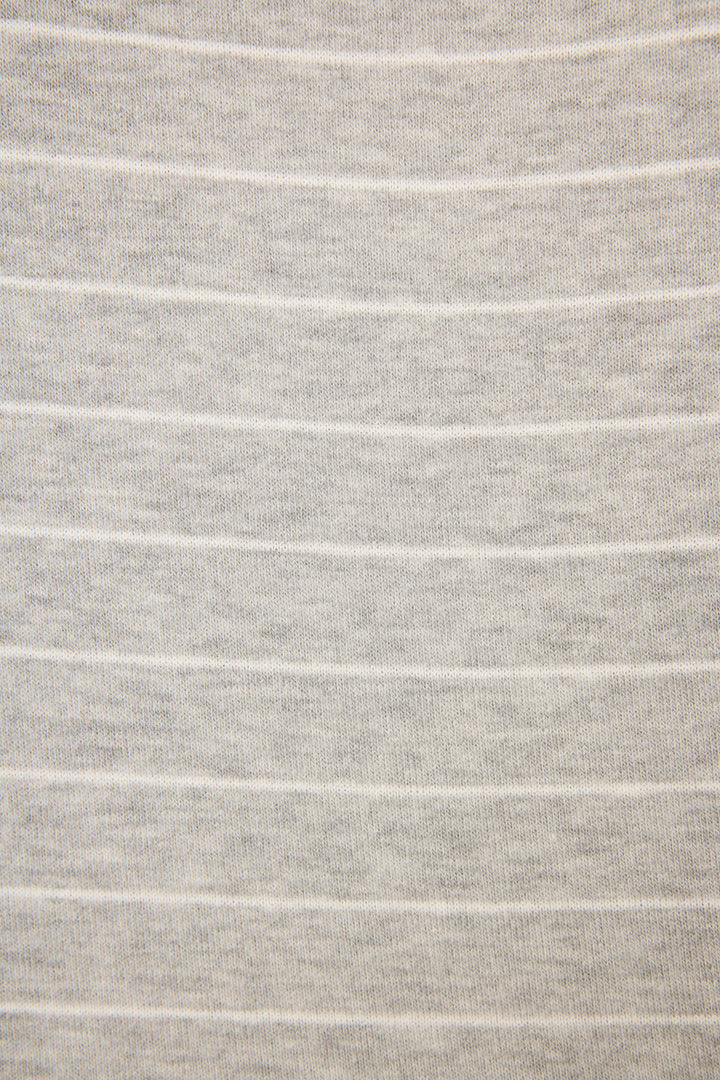 Close-up of the P.J. Salvage "My Dog Is My Valentine" Striped Hoodie’s light beige fabric, featuring soft ribbed texture and evenly spaced thin white horizontal stripes.