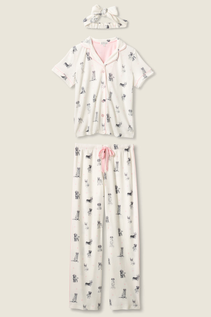 The P.J. Salvage My Dog Is My Valentine 3-Piece PJ Set includes a white short-sleeve button-up top, matching pants with a pink drawstring, and a headband, all featuring small dog prints and light pink accents.