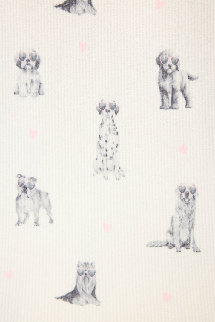 The My Dog Is My Valentine Plus Size PJ Set by P.J. Salvage features illustrated dogs in heart-shaped glasses, surrounded by pink hearts on a textured white background, with pups in a variety of playful poses.