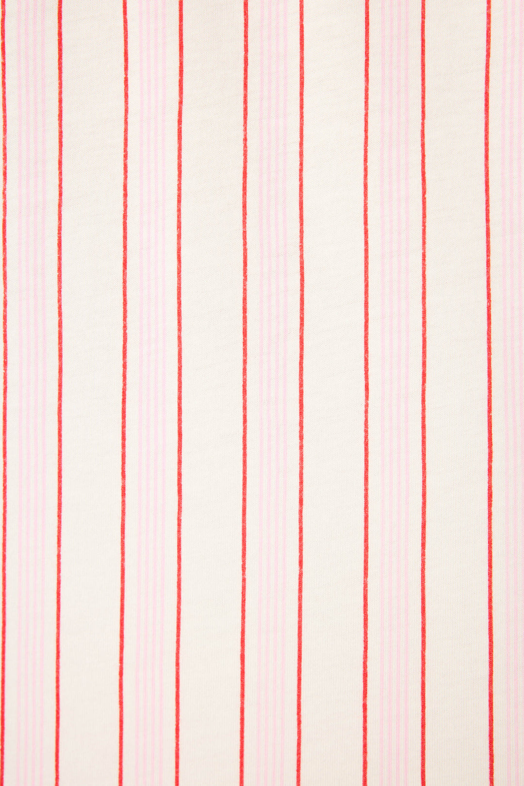 The Feeling Love Striped 3-Piece PJ Set by P.J. Salvage features a cream-colored fabric with evenly spaced vertical red and light pink stripes, arranged in an alternating, repetitive pattern.