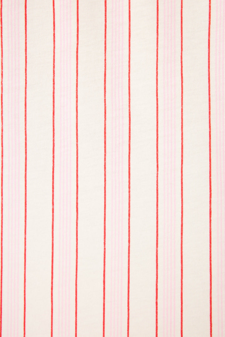 The Feeling Love Striped 3-Piece PJ Set by P.J. Salvage features a cream-colored fabric with evenly spaced vertical red and light pink stripes, arranged in an alternating, repetitive pattern.