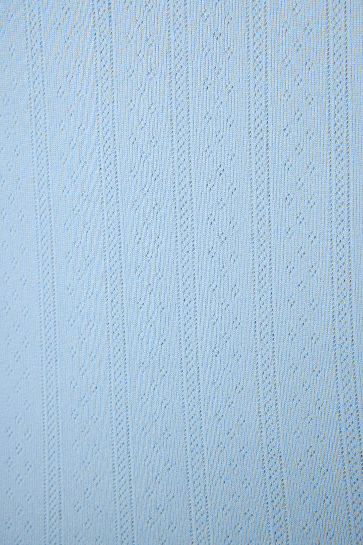 The More Amour Blue Dream Pointelle Tank Top by P.J. Salvage features light blue fabric with vertical textured stripes and a small dotted diamond pattern woven into the material.