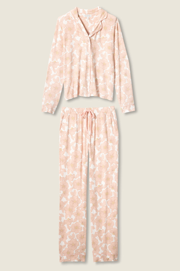 The Poppy Dreams Floral PJ Set by P.J. Salvage features a long-sleeve button-up top and drawstring pants in a light beige and white floral print, shown on a neutral background.
