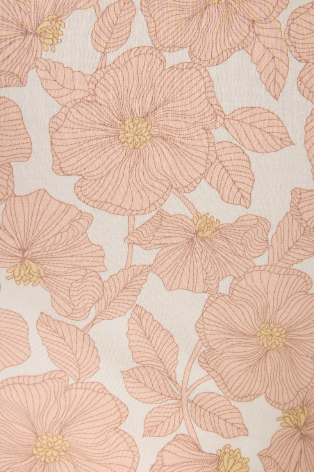 The P.J. Salvage Poppy Dreams Floral PJ Set showcases large, outlined flowers and leaves in light pink on an off-white background, detailed with fine lines for a delicate look.