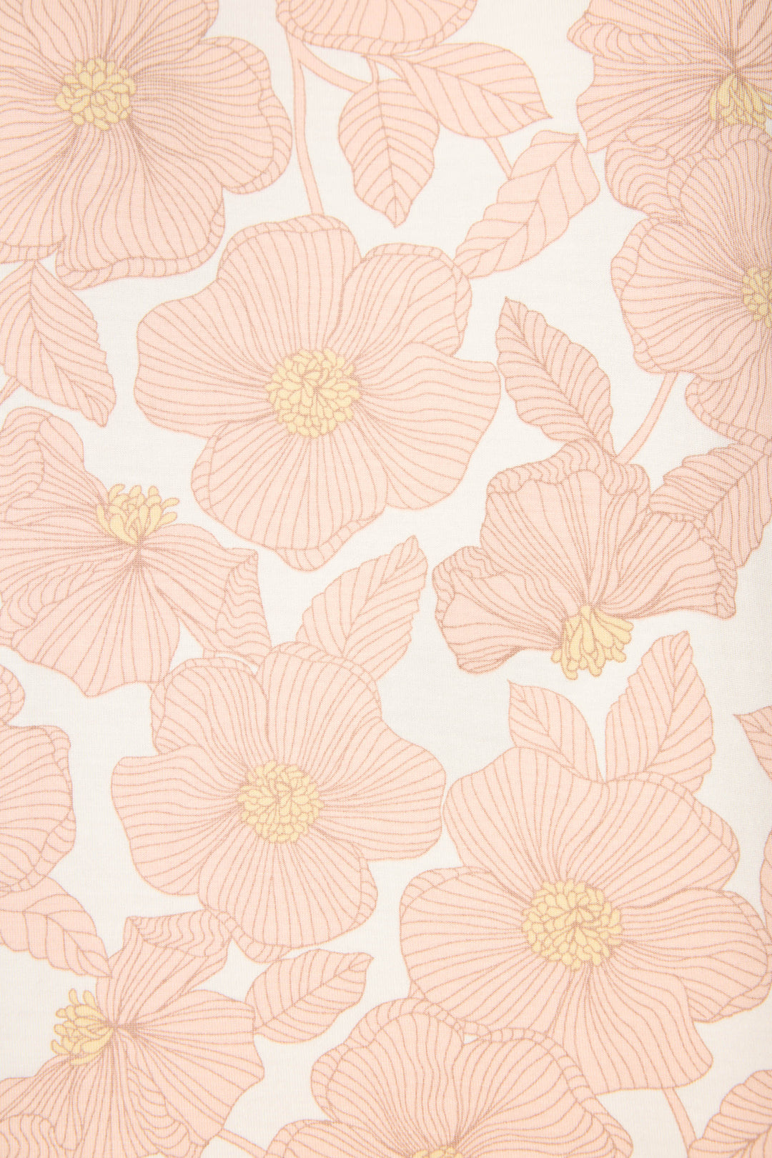 The Poppy Dreams Floral Shorts by P.J. Salvage feature a cream-colored fabric adorned with large light pink flowers, yellow centers, and detailed linework, each bloom surrounded by leaves in a repeating pattern.