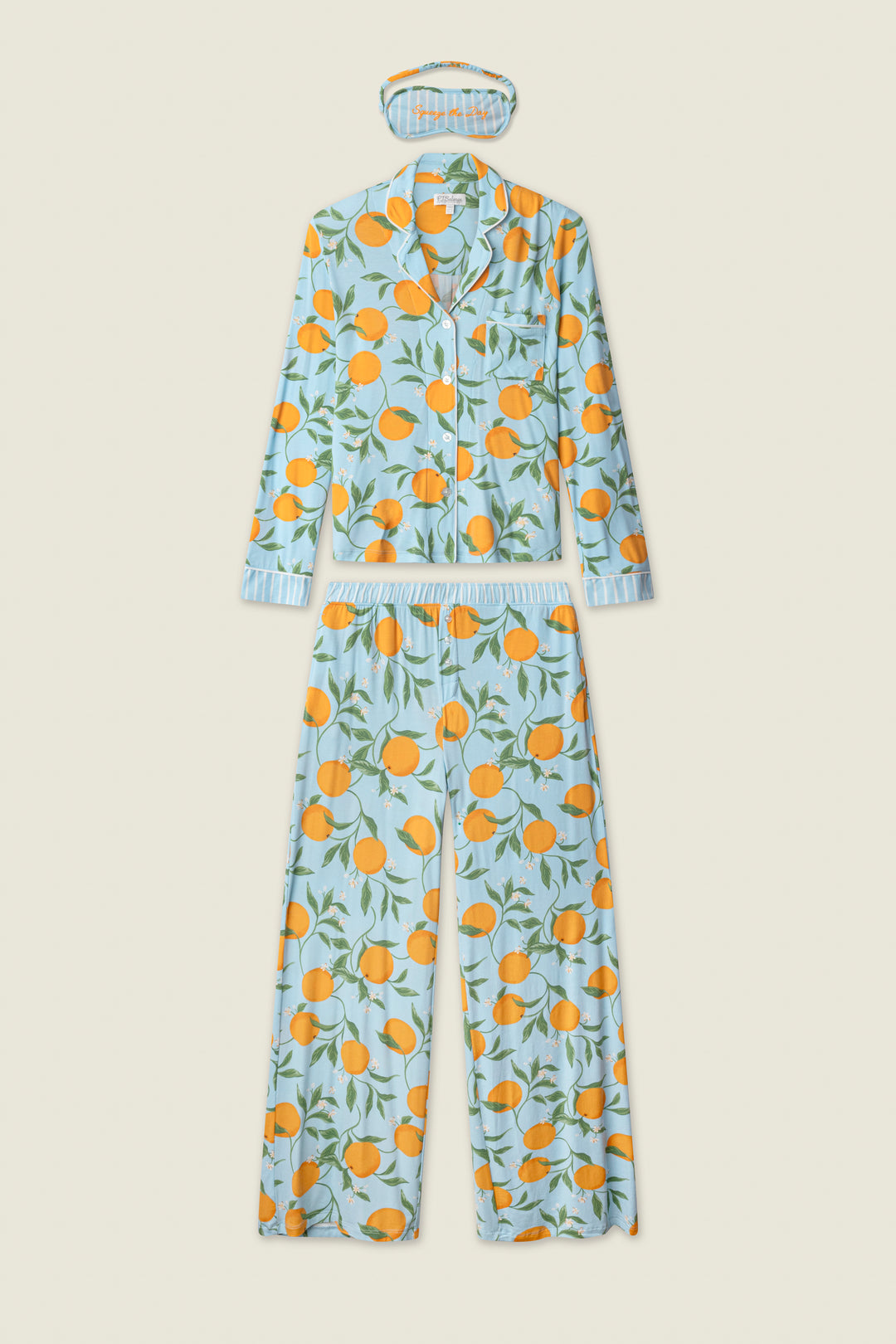 The Citrus Dreams Morning Squeeze Long 3-Piece PJ Set by P.J. Salvage features a blue women's pajama set with a button-up long sleeve top, long pants, and sleep mask—all featuring playful orange fruit and green leaf prints.