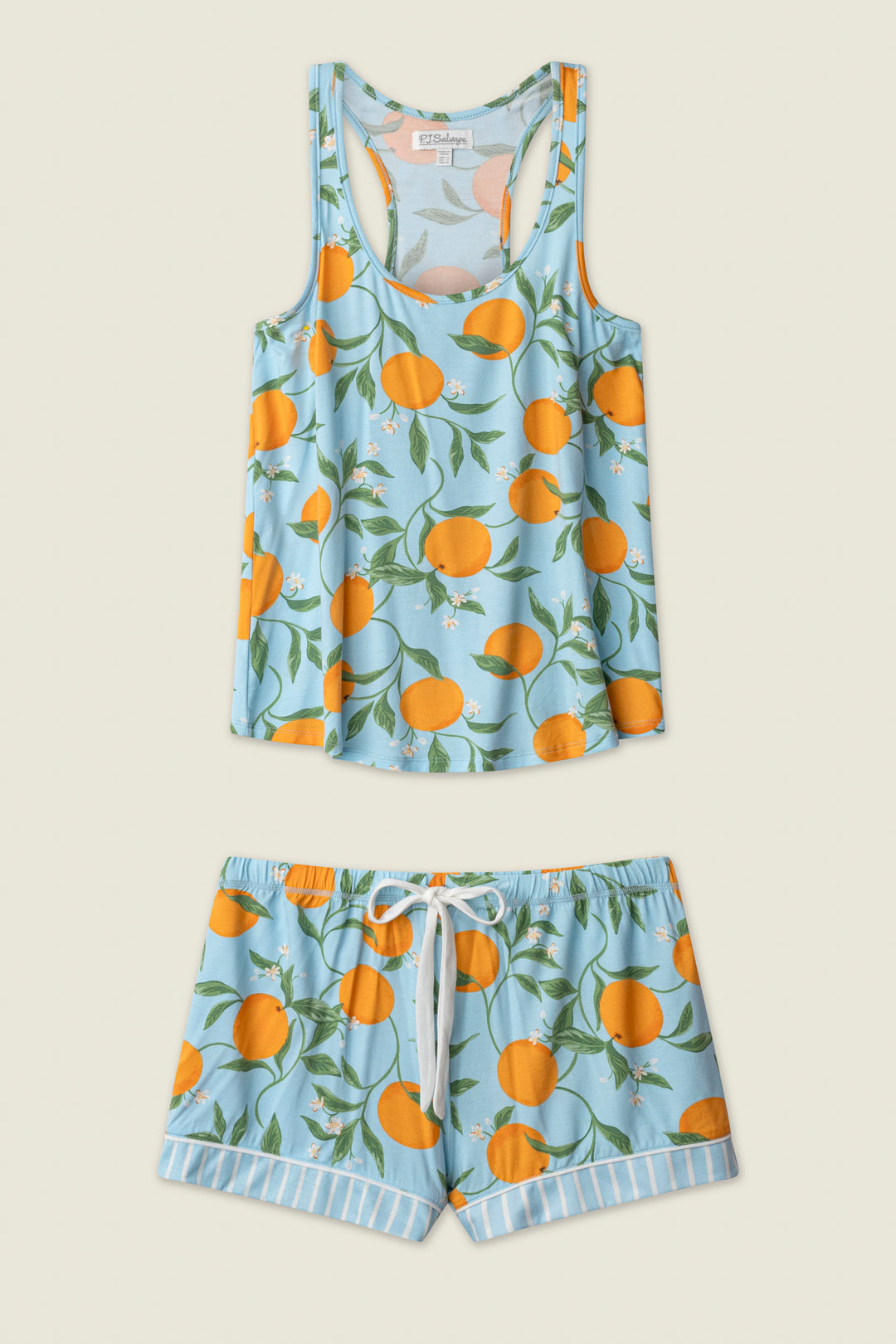 The Citrus Dreams Morning Squeeze Short PJ Set by P.J. Salvage features a playful orange and green citrus print on soft jersey, with a sleeveless tank top and drawstring shorts trimmed in white and blue stripes.